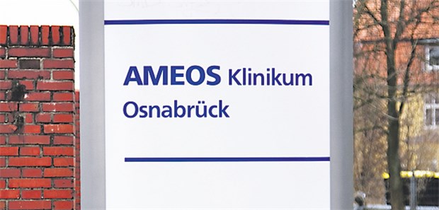 Knackpunkt ist der Kündigungsschutz Hinweisschild am psychiatrischen Ameos-Krankenhaus in Osnabrück: Dort streiken Mitarbeiter seit neun Wochen.