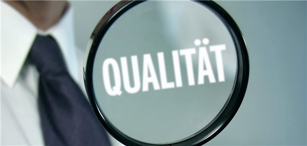 Qualität in einer Lupe;