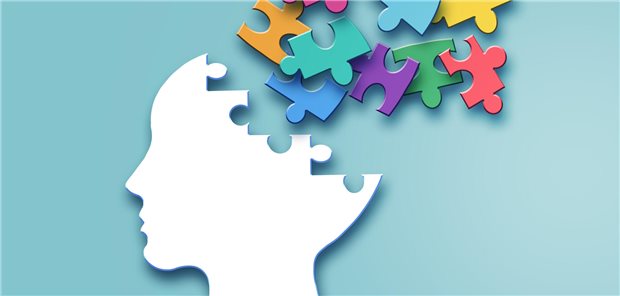 Ein Kopf mit Puzzelteilen. 