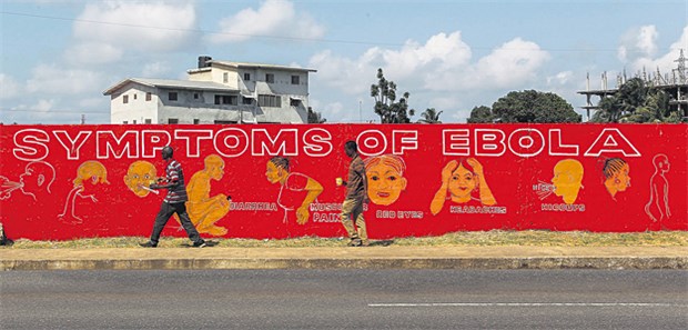 In Liberia wütet die Seuche am schlimmsten Auf einem Bauzaun in der liberianischen Hauptstadt Monrovia sind typische Symptome einer beginnenden Ebola-Erkrankung dargestellt. Das Land ist zurzeit am schlimmsten von der Seuche betroffen.