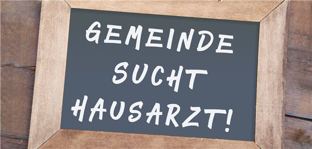 Fast 3300 Hausarztstellen sind unbesetzt Tafel mit "Gemeinde sucht Hausarzt"