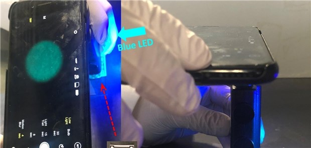 Mit dem Smartphone Noroviren aufspüren Das zum Fluoreszenzmikroskop umgewandelte Smartphone analysiert auf einen Chip aufgebrachte kontaminierte Wasserproben.
