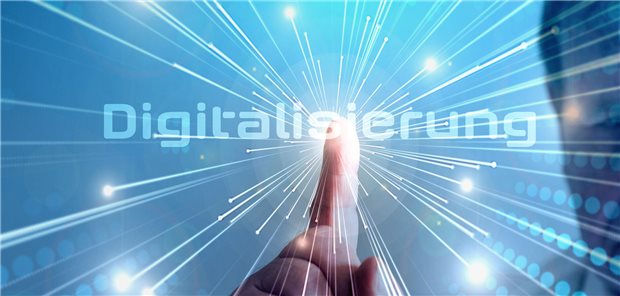 Finger tippt auf das Wort Digitalisierung.