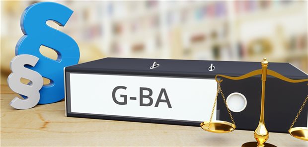Ein Ordner mit der Aufschrift &quot;GBA&quot; vor verschiedenen Symbolen der Justiz