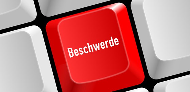 Schulterzucken in Psychiatrien Der rote Knopf.