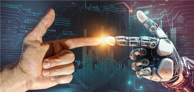 Bundesärztekammer-Chef sieht wachsende Bedeutung Künstlicher Intelligenz Roboterfinger berührt menschlichen Finger.