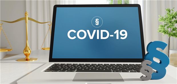 Bildschirm mit Aufschrift "COVID-19"