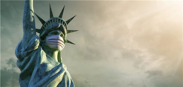 Umfrage: Mehrheit der Amerikaner hatte COVID-19 Die Freiheitsstatue mit MNS: Einer Umfrage zufolge steigt die Zufriedenheit der US-Bürger mit dem Corona-Management.