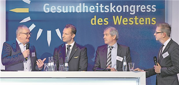 Dr. Matthias Bracht, Philip Keil, Professor Jens Scholz, Professor Wolfgang Greiner (v.l.n.r.).