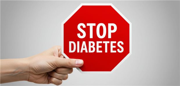 Jemand hält ein Stop-Schild in der Hand auf dem &quot;Stop Diabetes&quot; steht.