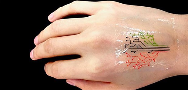 Lebende Zellen als intelligente Tattoos? Ein dünnes Pflaster mit lebenden Bakterienzellen – hergestellt mittels 3D-Druck – reagiert farblich auf Umweltreize.