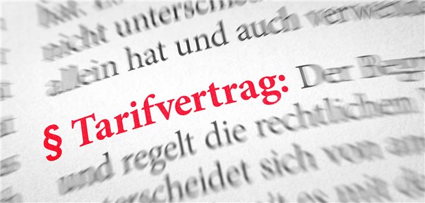 Gesetzbuch mit einem Paragrafen zu Tarifvertrag. (Symbolbild)