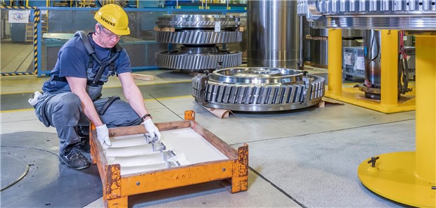 Soft-Orthese animiert zu ergonomischen Bewegungen ErgoJack mit arretierbarem Hüftgelenk und Beinbügel unterstützt beim Heben schwerer Lasten.