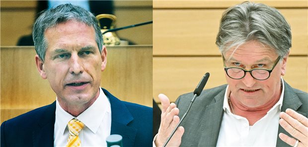 Im Schlagabtausch mit der Opposition im Landtag Baden-Württemberg: Der FDP-Abgeordnete Jochen Haußmann, Gesundheitsminister Manfred Lucha (Grüne, v.l.).