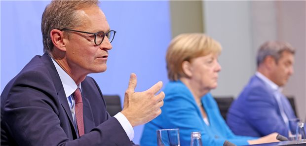Schnelltests ab 11. Oktober kostenpflichtig – Druck auf Ungeimpfte wächst Michael Müller (SPD), Angela Merkel (CDU) und Markus Söder (CSU) auf der Pressekonferenz am 10. August 2021.