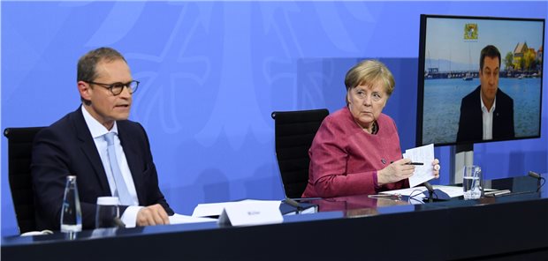 Erste Länder wollen Ministerpräsidenten-Runde zu Corona vorziehen Kanzlerin Angela Merkel (M.) zeigt sich offen für die Idee, die Ministerpräsidenten-Runde zu Corona vorzuverlegen.