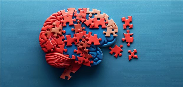 Ein Gehirn dargestellt in Puzzleteilen, die durcheinandergeraten sind. 