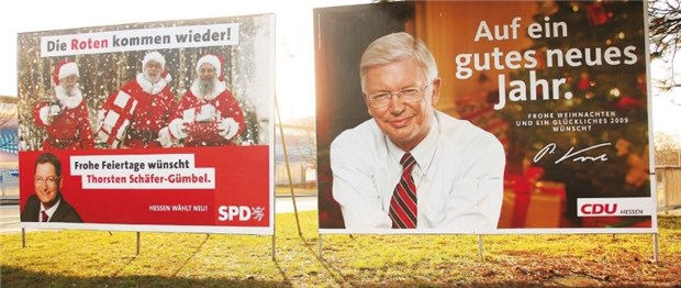 Parteien in Hessen setzen auf Gesundheit Neujahrsbotschaften für´s Wahlvolk: Herausforderer (li.) und Amtsinhaber werben Seit‘ an Seit‘.