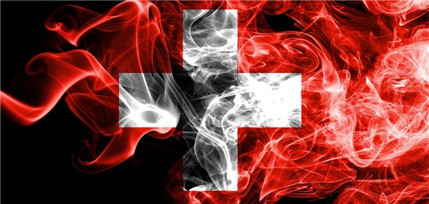 Schweiz pfeift auf Tabakgelder für Expo Schweizer Flagge im Rauch: Der Pavillon der Eidgenossen kommt auf der Weltausstellung ohne Tabakgelder aus.