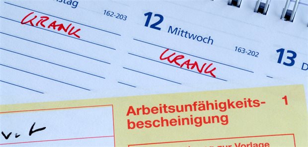 Formular Arbeitsunfähigkeitsbescheinigung auf Tischkalender.