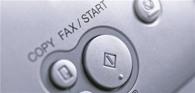 Der Startknopf bei einem Faxgerät.