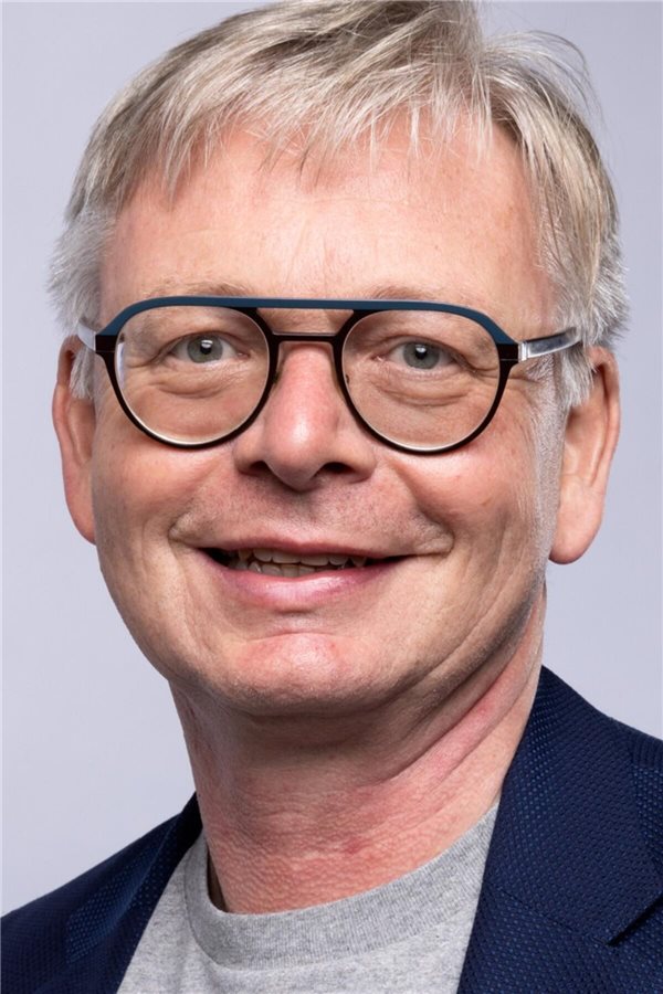 Michael Hubmann lächelt in die Kamera.